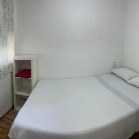 Quarto em Acomodações Particulares Casa Sur H1